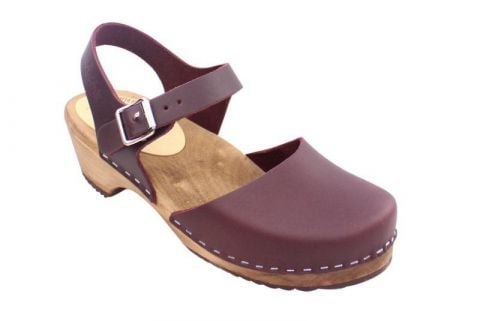 Low Wood Clogs in Aubergine on Brown wooden clogs Base