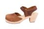 Brown clogs in oiled nubuck on a natural wooden clogs base with rubber sole by Lotta from Stockholm. Side view