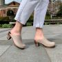 Wearing High Heeled Clogs Oatmeal Oiled Nubuck with a dark wooden base by Lotta from Stockholm