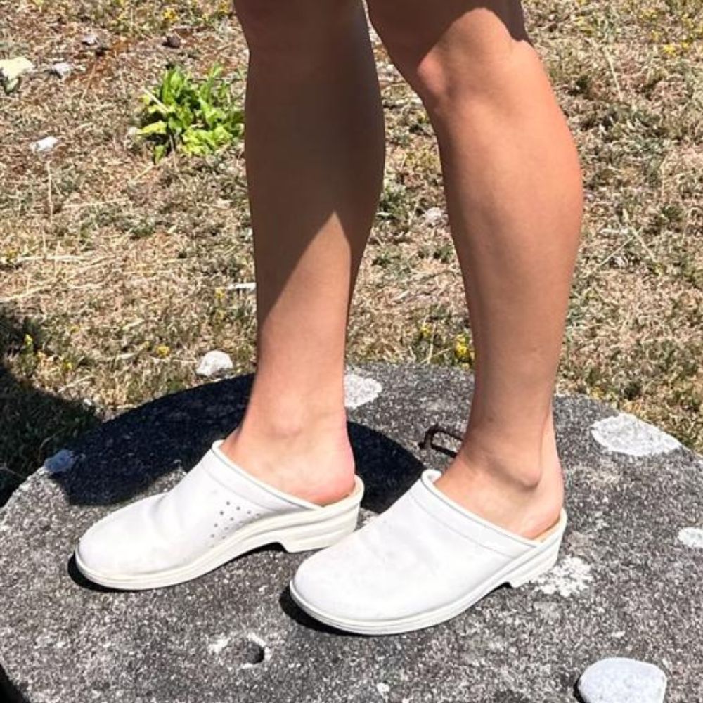 white sliders. Classic clogs in white leather soft sole
