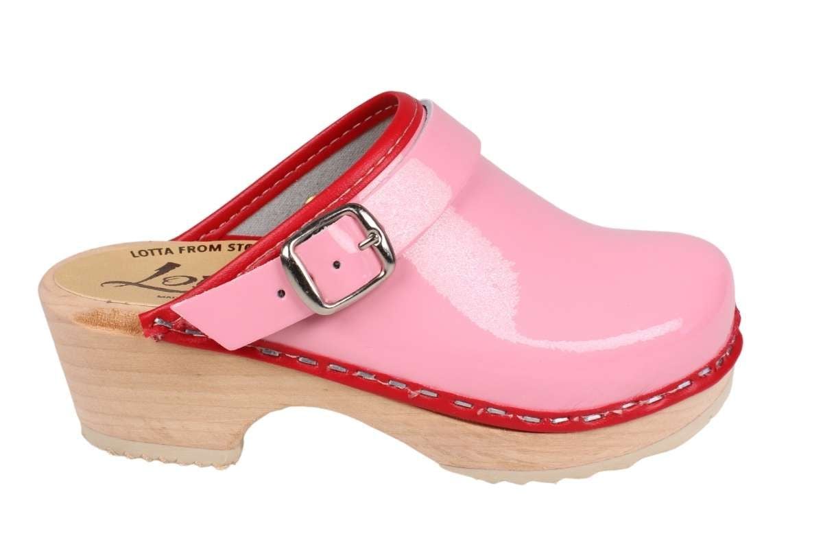 Kids Clogs Pink Patent Leather with a red trim and natural wooden base by Lotta from Stockholm