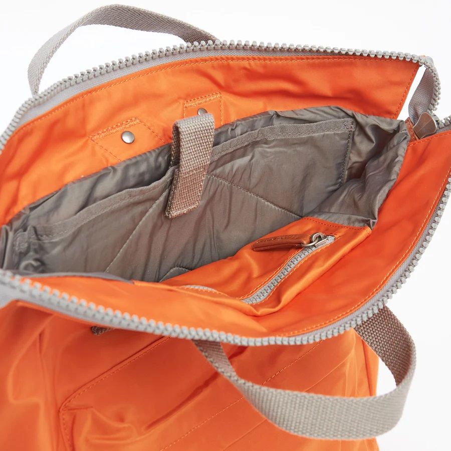 Roka Bantry B Vegan Bag in Burnt Orange. Lotta from Stockholm detail view of inside laptop and zipped pocket
