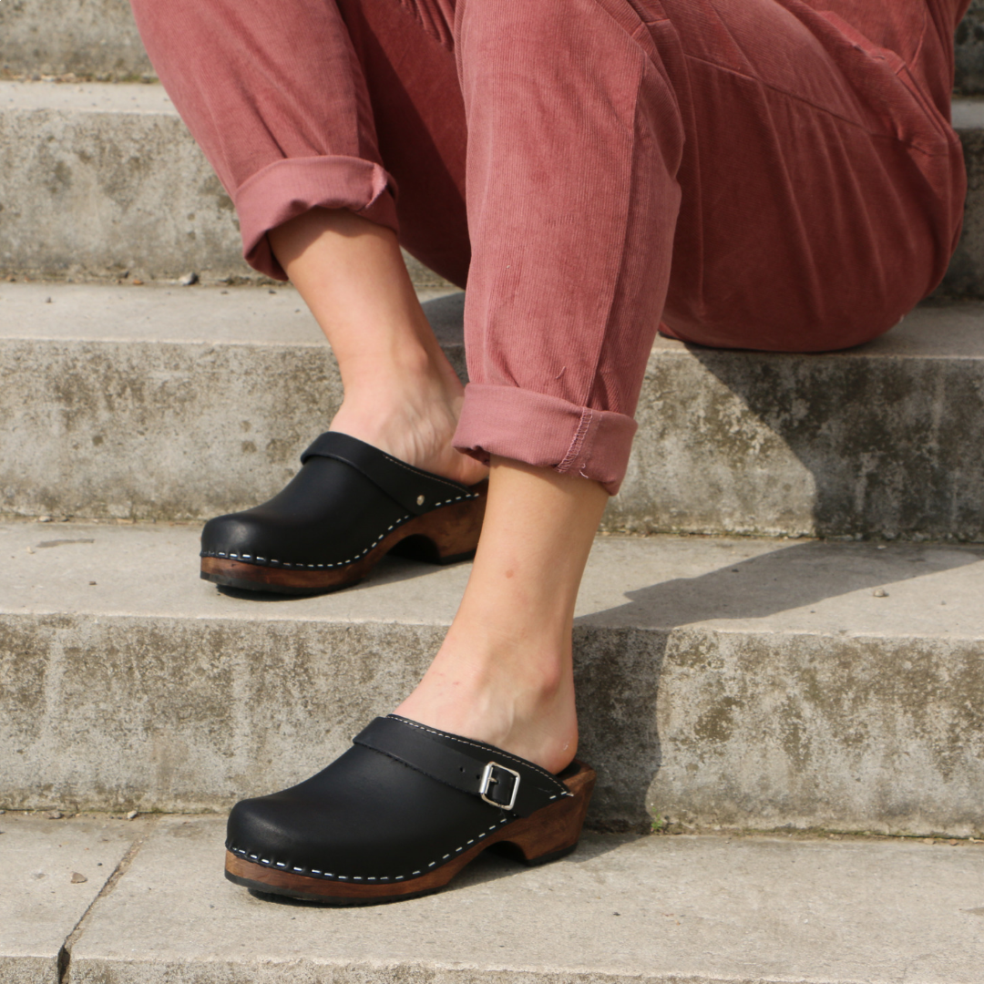 Classic Black clogs with strap on Brown Base
